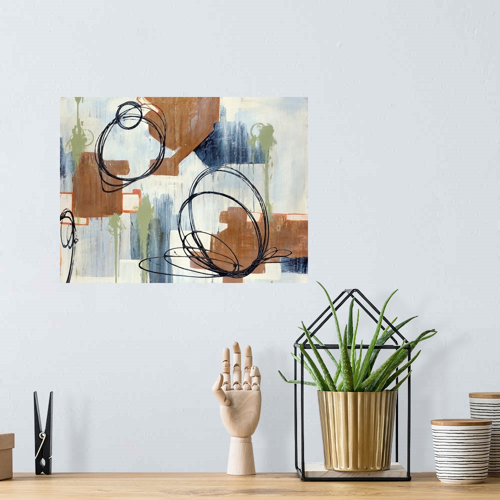A bohemian room featuring Abstract painting of circles and various other shapes on canvas.