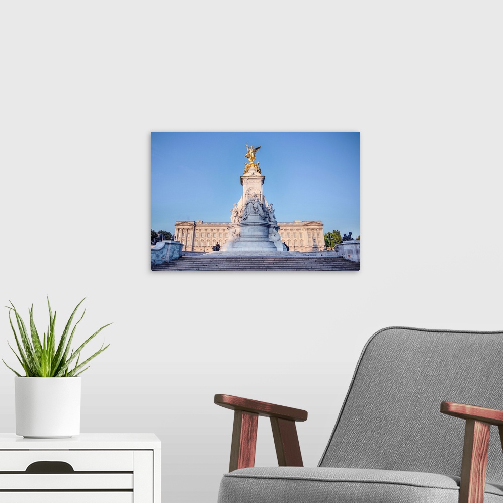 A modern room featuring The Victoria Memorial is located near Buckingham Palace and is a monument to Queen Victoria.