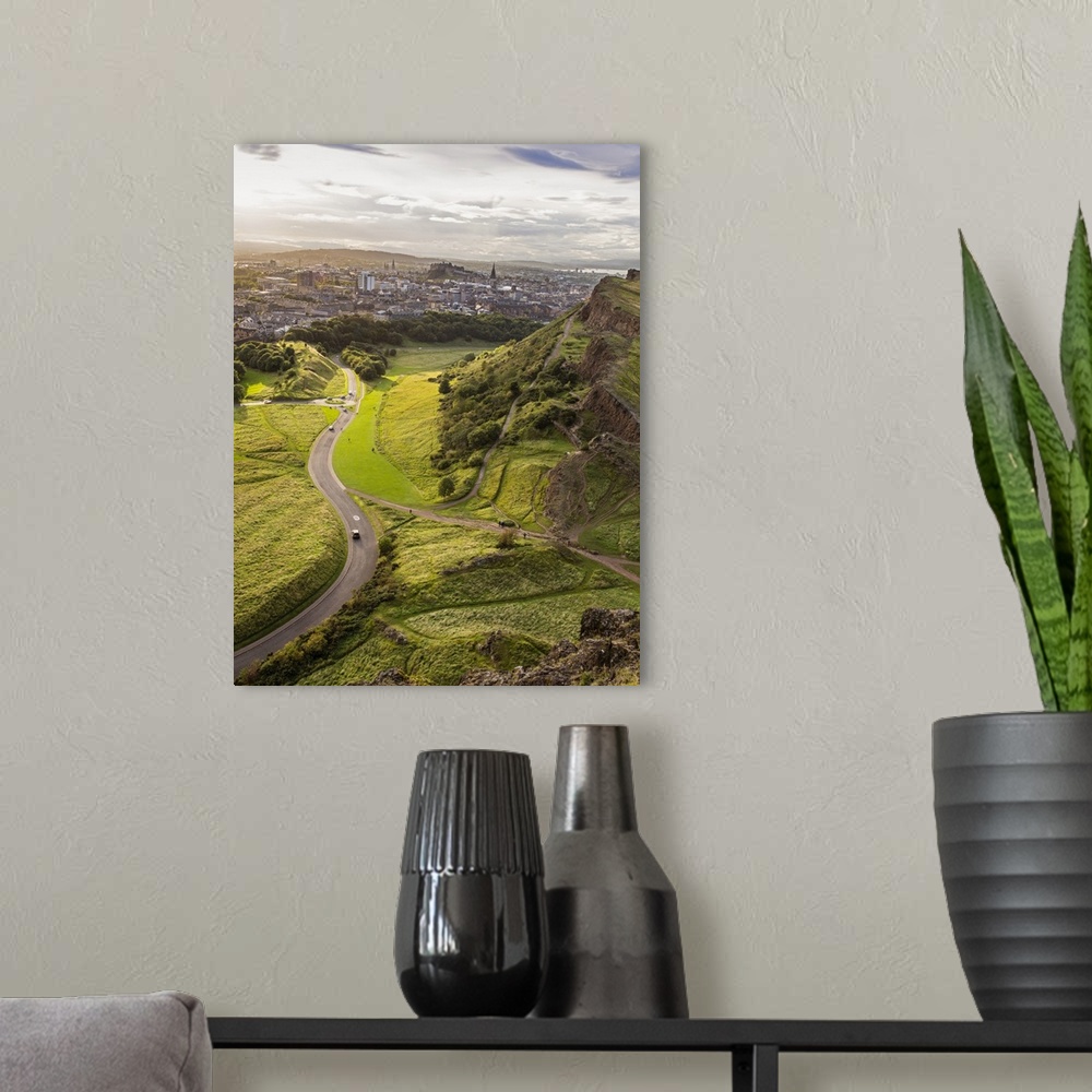 A modern room featuring Photograph of Salisbury Crags, Castle Rock, and the city of Edinburgh, Scotland from Holyrood Park.