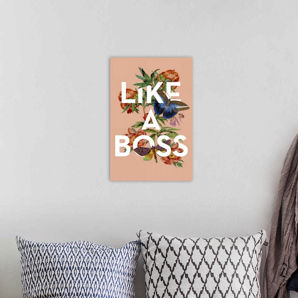 A bohemian room featuring A collage of vintage flowers and insects intertwined with the words Like a Boss on a peach backgr...