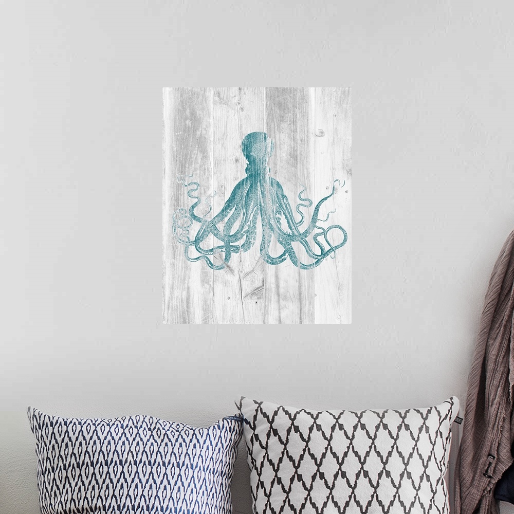 A bohemian room featuring Vintage illustration of a blue octopus over a faux white barnwood background.
