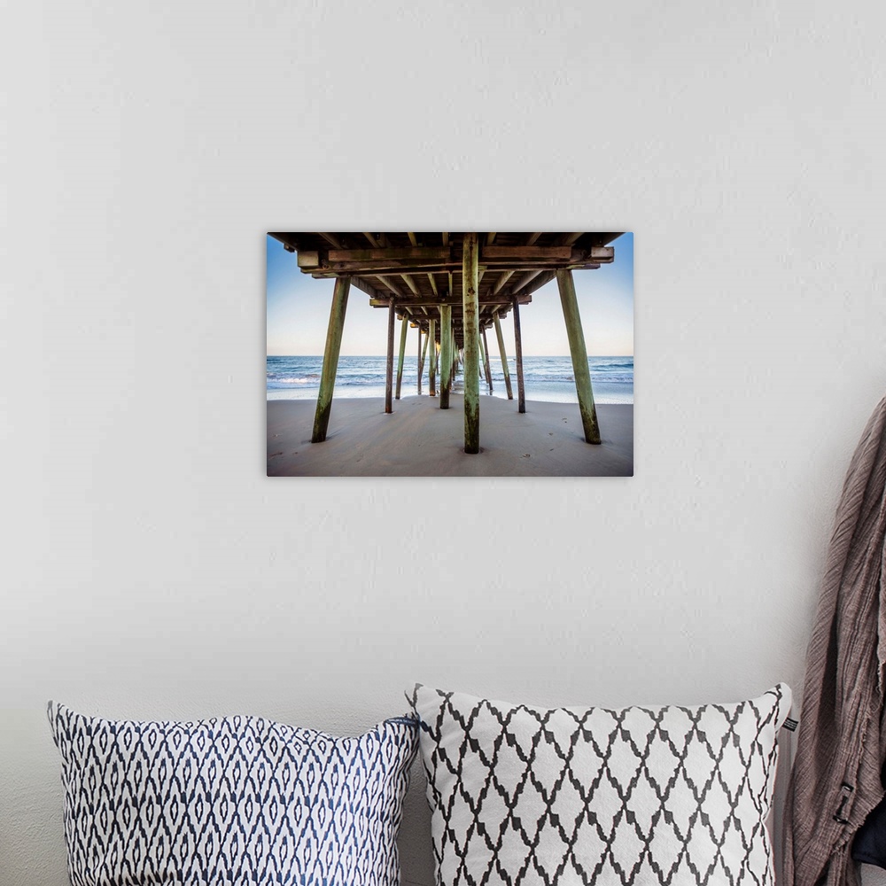 A bohemian room featuring View of the underside of Virginia beach's fishing pier.