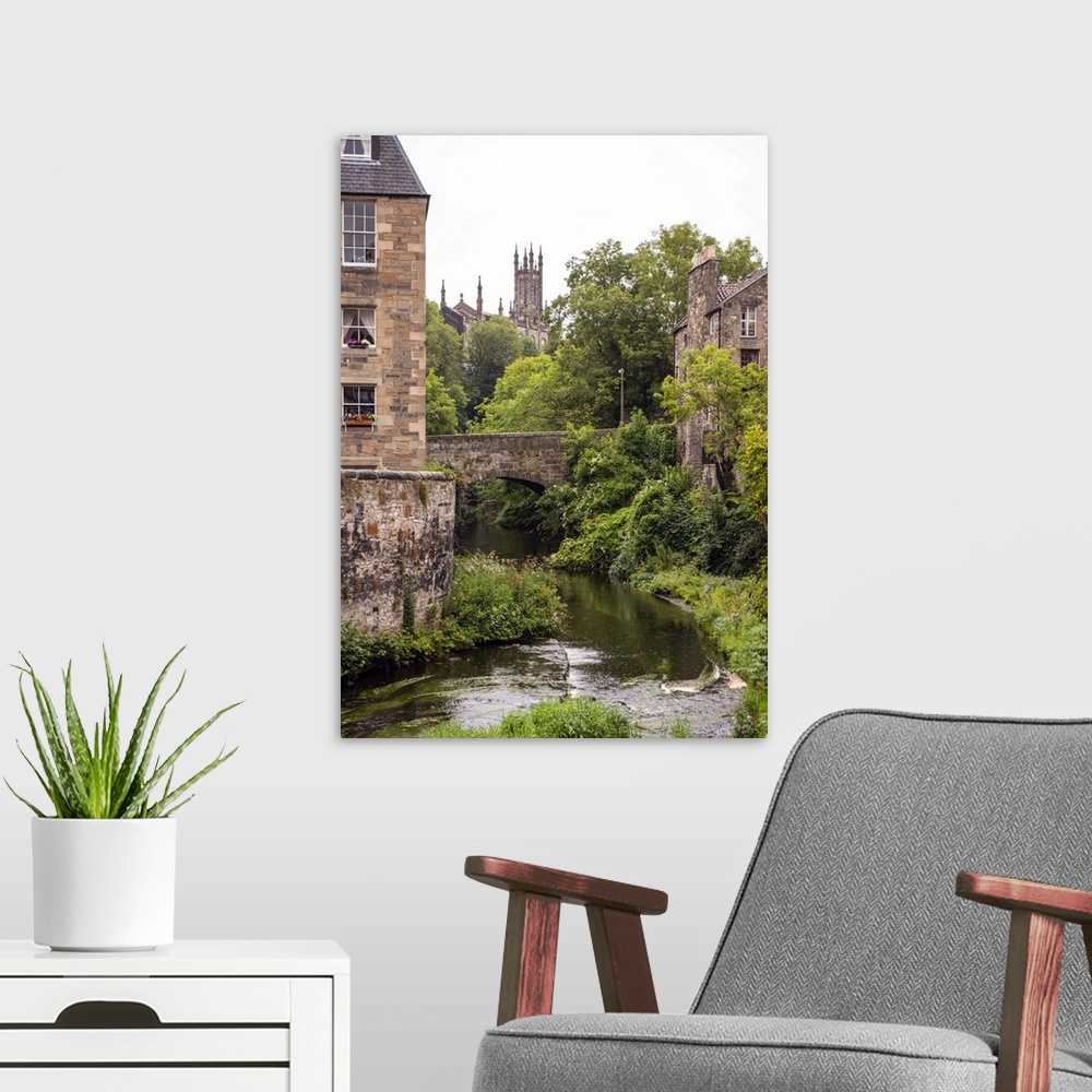 A modern room featuring Beautiful photograph of Water of Leith river flowing through Edinburgh architecture and under a b...