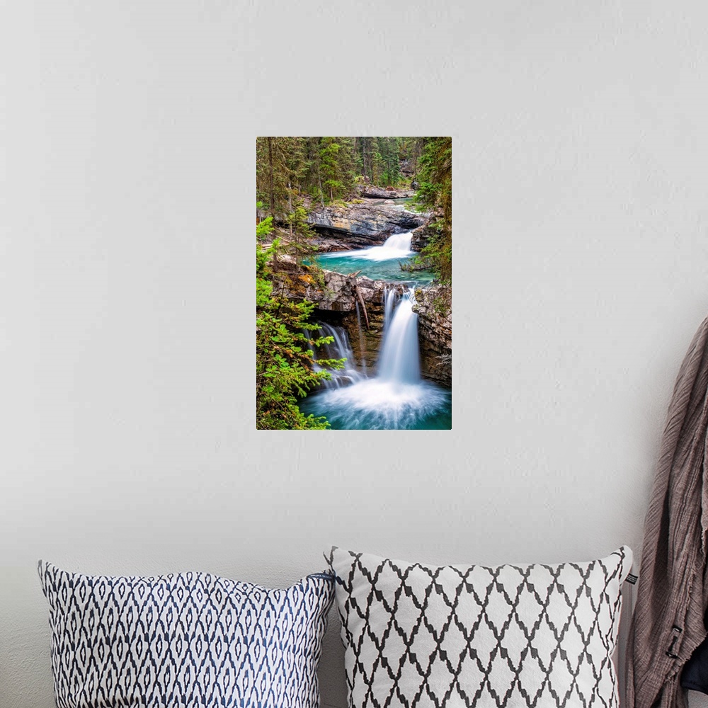 A bohemian room featuring Waterfall at Johnston Canyon in Banff National Park, Alberta, Canada.