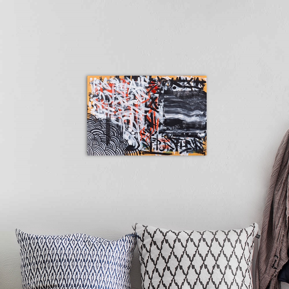 A bohemian room featuring Urban abstract painting in orange, white, and black.
