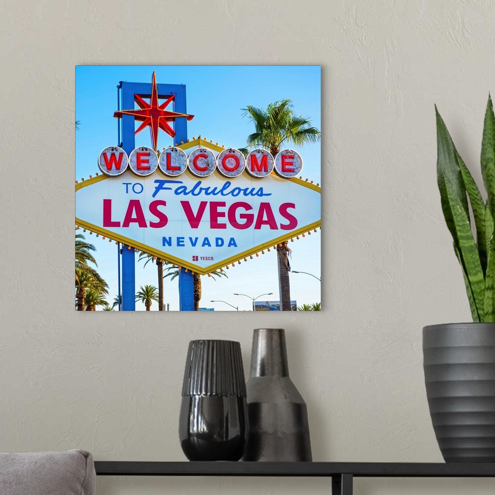 A modern room featuring Square photograph of the Welcome to Fabulous Las Vegas Nevada sign.