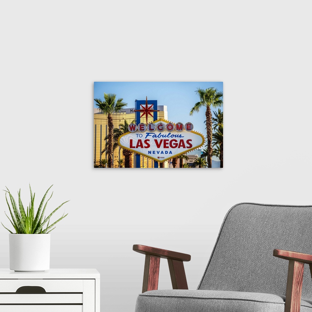 A modern room featuring Photograph of the Welcome to Fabulous Las Vegas Nevada sign with palm trees in the background.