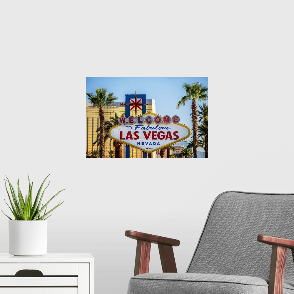 A modern room featuring Photograph of the Welcome to Fabulous Las Vegas Nevada sign with palm trees in the background.