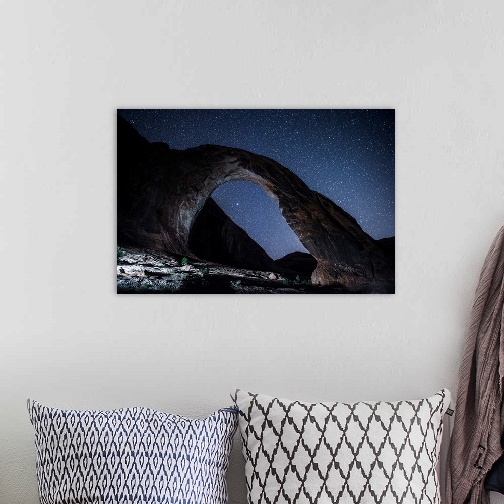 A bohemian room featuring View of the west side of Corona Arch, also known as Little Rainbow Bridge, near Arches National P...