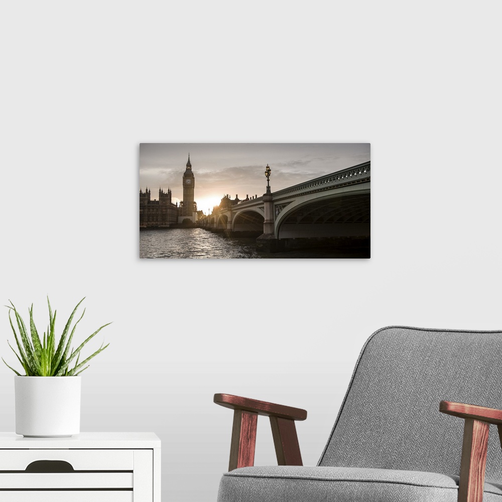 A modern room featuring Photograph of the Westminster Bridge over the River Thames with Big Ben in the background at suns...