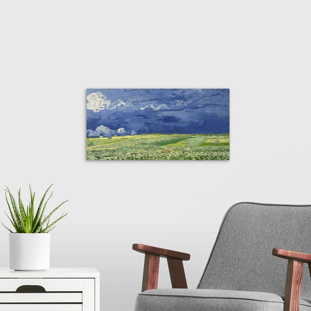 A modern room featuring Vincent van Gogh - Wheatfield under thunderclouds.