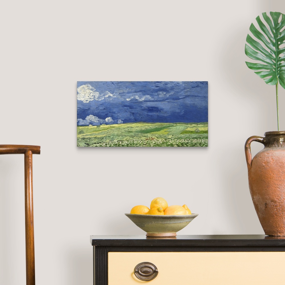 A traditional room featuring Vincent van Gogh - Wheatfield under thunderclouds.