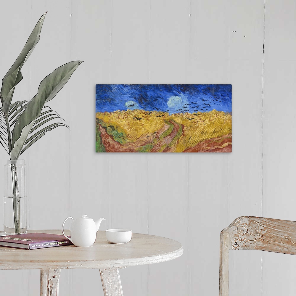 A farmhouse room featuring Vincent van Gogh's Wheatfield with Crows (1890) famous landscape painting.