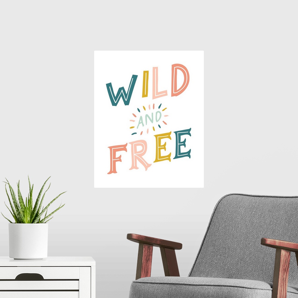 A modern room featuring Typography artwork with the words, "Wild and Free".