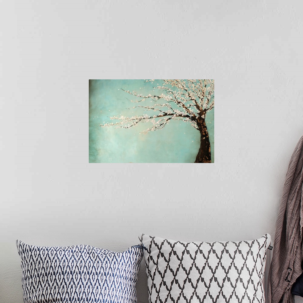 A bohemian room featuring Painting of a tree full of blooming flowers swaying in the wind against a cool background.