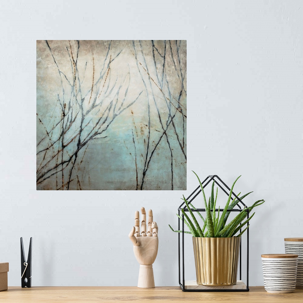 A bohemian room featuring Painting of tree limbs on top of a grungy backdrop on a square canvas.