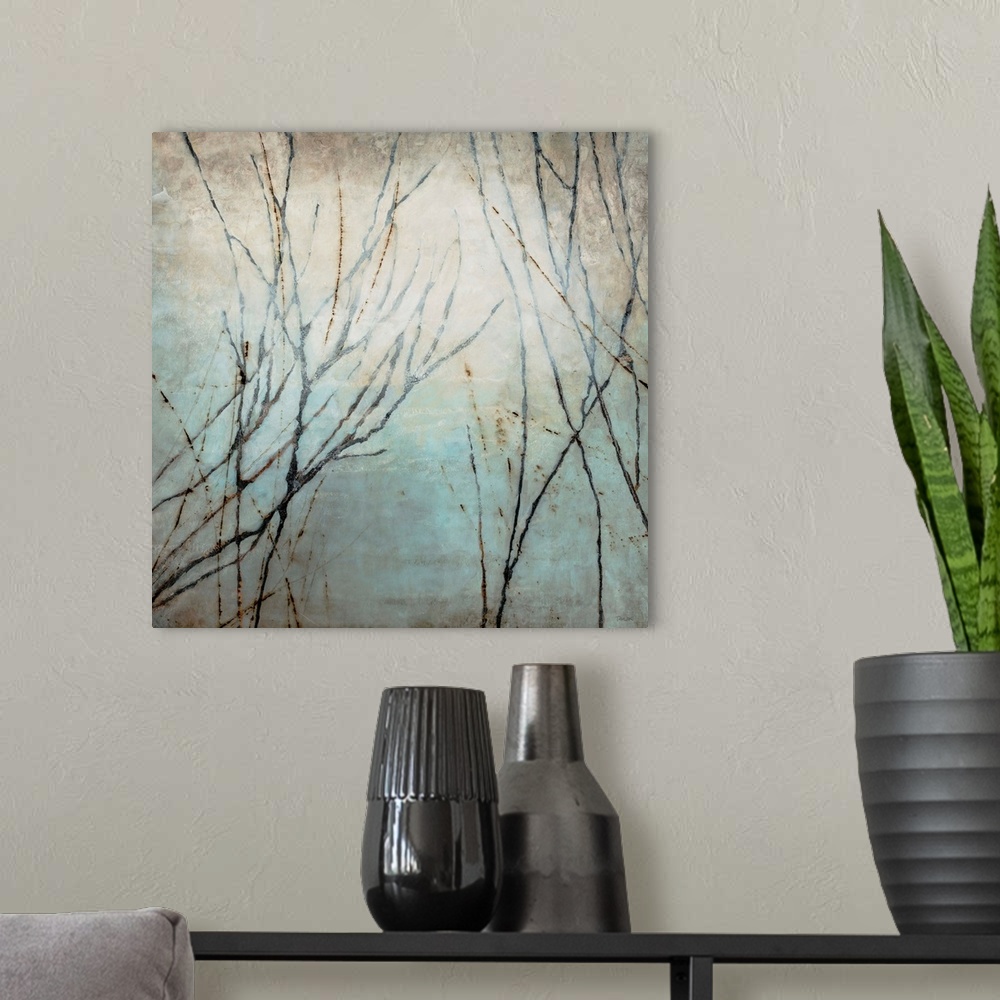 A modern room featuring Painting of tree limbs on top of a grungy backdrop on a square canvas.