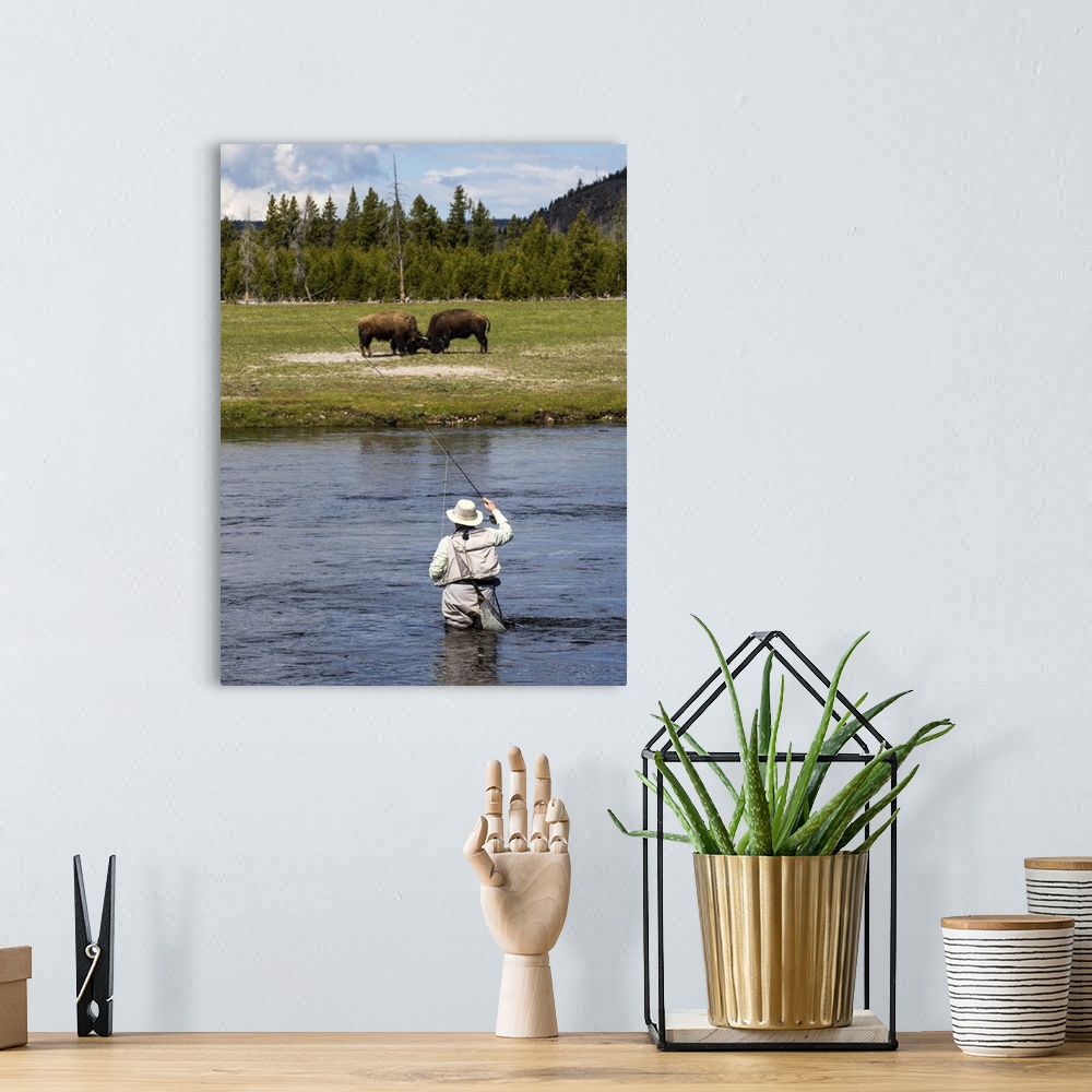 A bohemian room featuring Person fly fishing in a river at Yellowstone National Park.