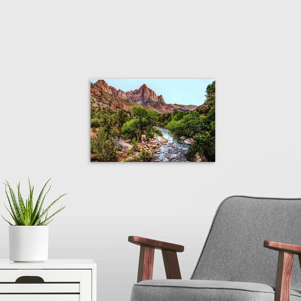A modern room featuring Landscape photograph of Zion National Park with the Virgin River.