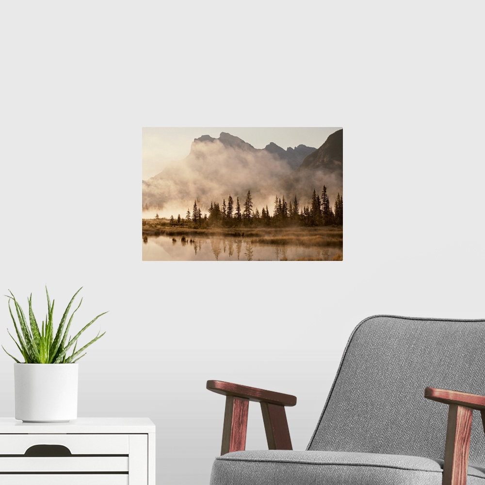 A modern room featuring Foggy sunrise over the Vermilion Lakes.