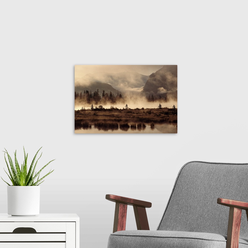 A modern room featuring Big landscape photograph from the National Geographic Collection of foggy Banff National Park in ...