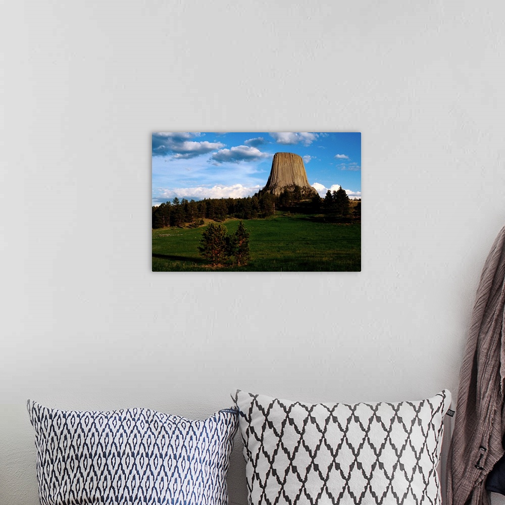 A bohemian room featuring Distant view of Devil's Tower.
