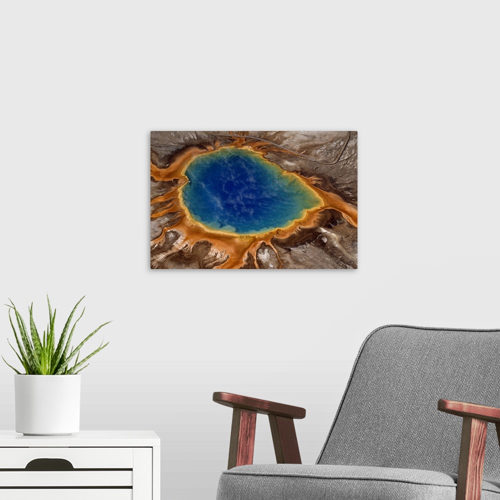 A modern room featuring Algae-tinted shallows ring Yellowstone's steaming Grand Prismatic Spring.  At 370 feet in width, ...