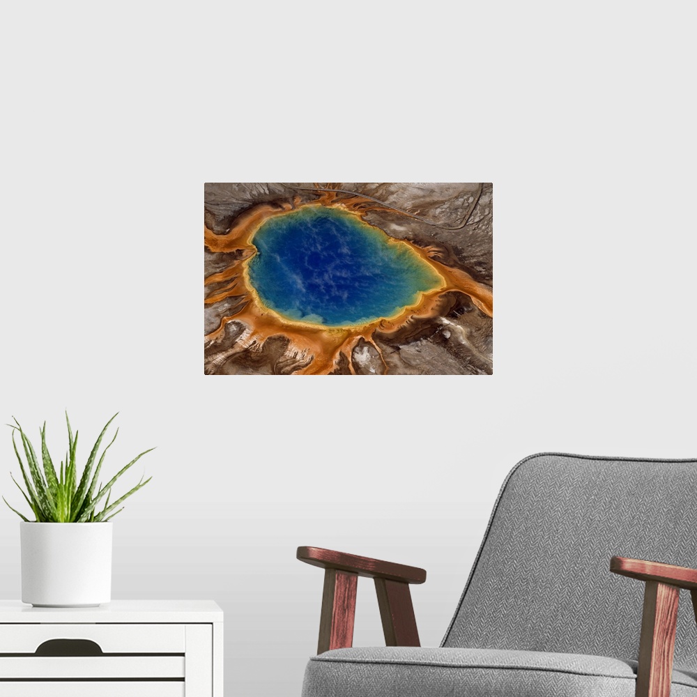 A modern room featuring Algae-tinted shallows ring Yellowstone's steaming Grand Prismatic Spring.  At 370 feet in width, ...
