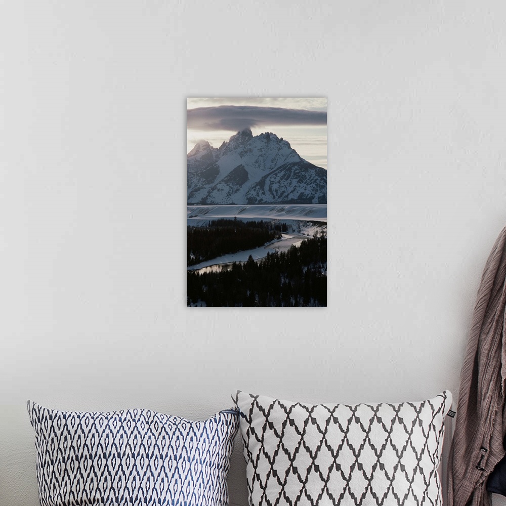 A bohemian room featuring Grand Teton Mountain and the Snake River in winter.