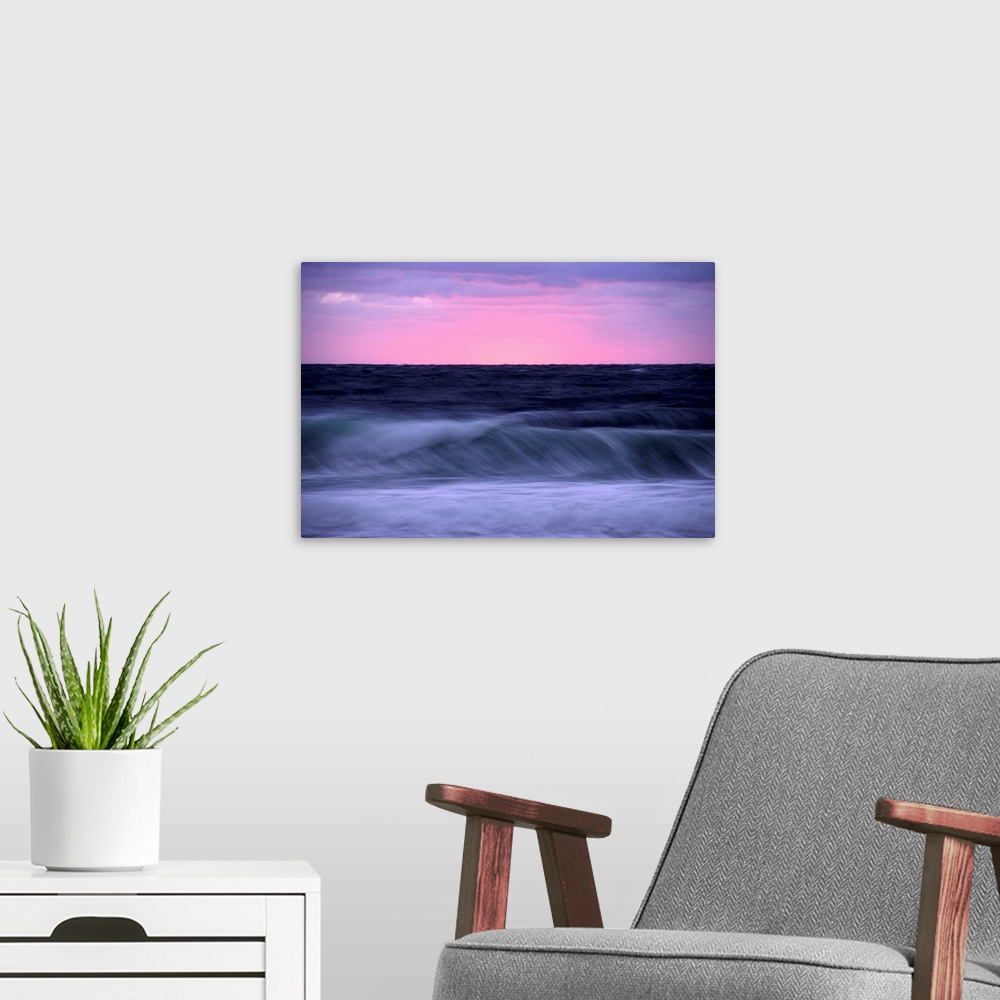 A modern room featuring Sunset and storm surf on the Gulf of St.Lawrence. This picture was taken from C ape Breton Highla...