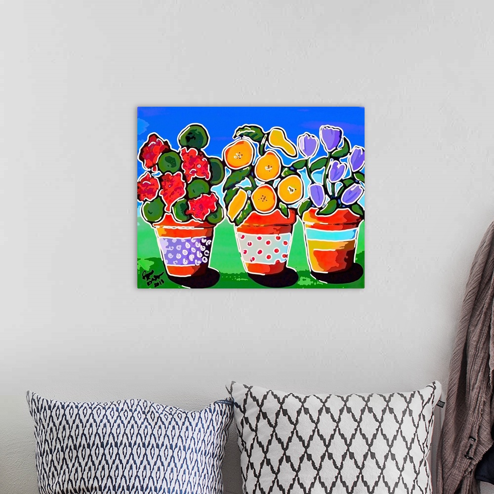 A bohemian room featuring Stylized version of folk art painting of 3 colorful, whimsical pots of flowers.