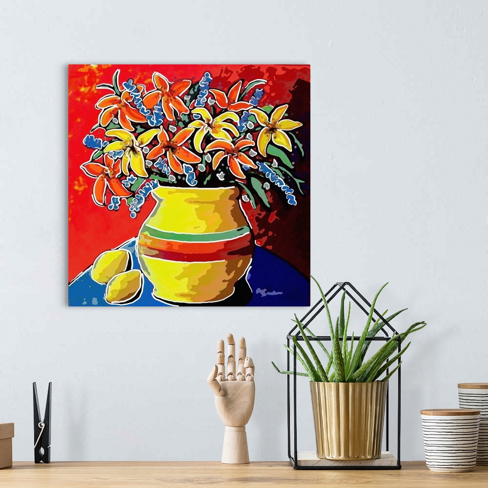 A bohemian room featuring This is a stylized still life with lillies and lemons.