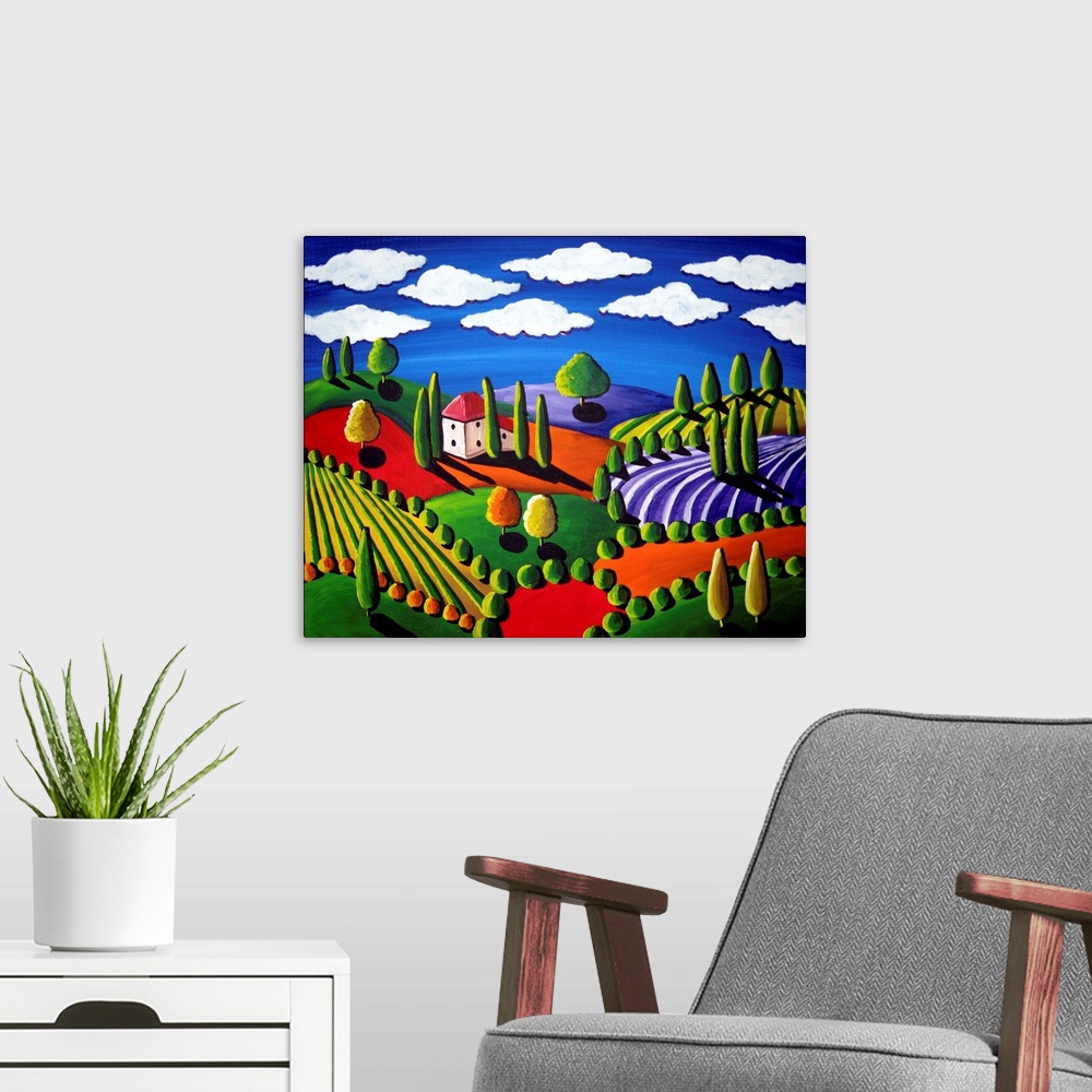 A modern room featuring Colorful painting of rolling hills and trees with a single house and white, fluffy clouds above.