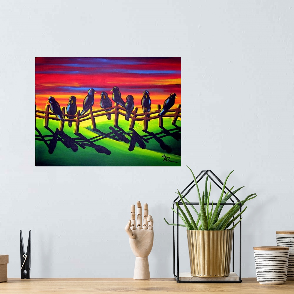 A bohemian room featuring Colorful Fall sunset is the backdrop to a group of crows who've perched on a fence.