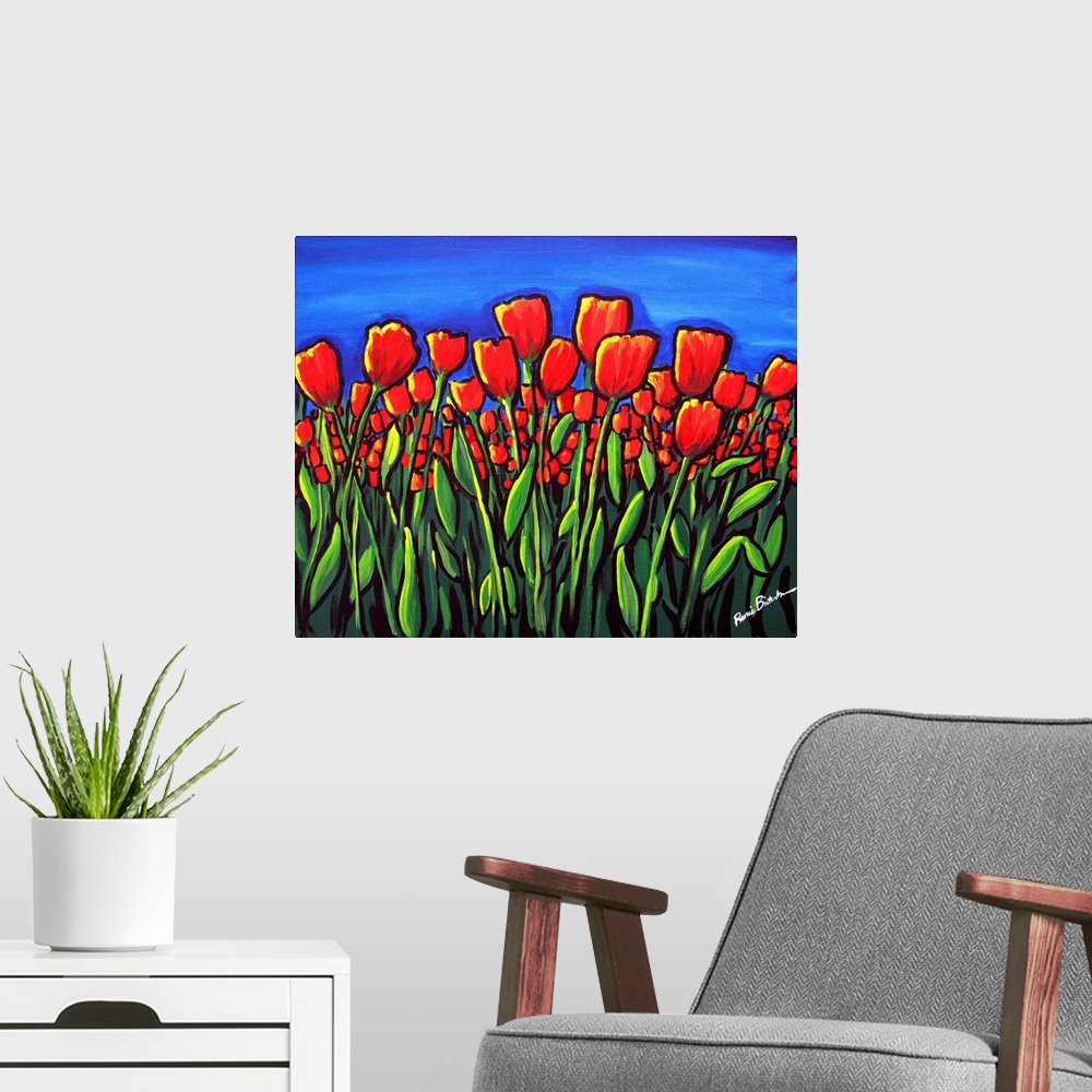 A modern room featuring Vibrant red tulips contrasted against a deep blue sky.