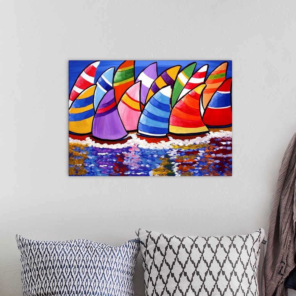 A bohemian room featuring Colorful sailboats enjoying the day, reflect into the water under a blue sky.