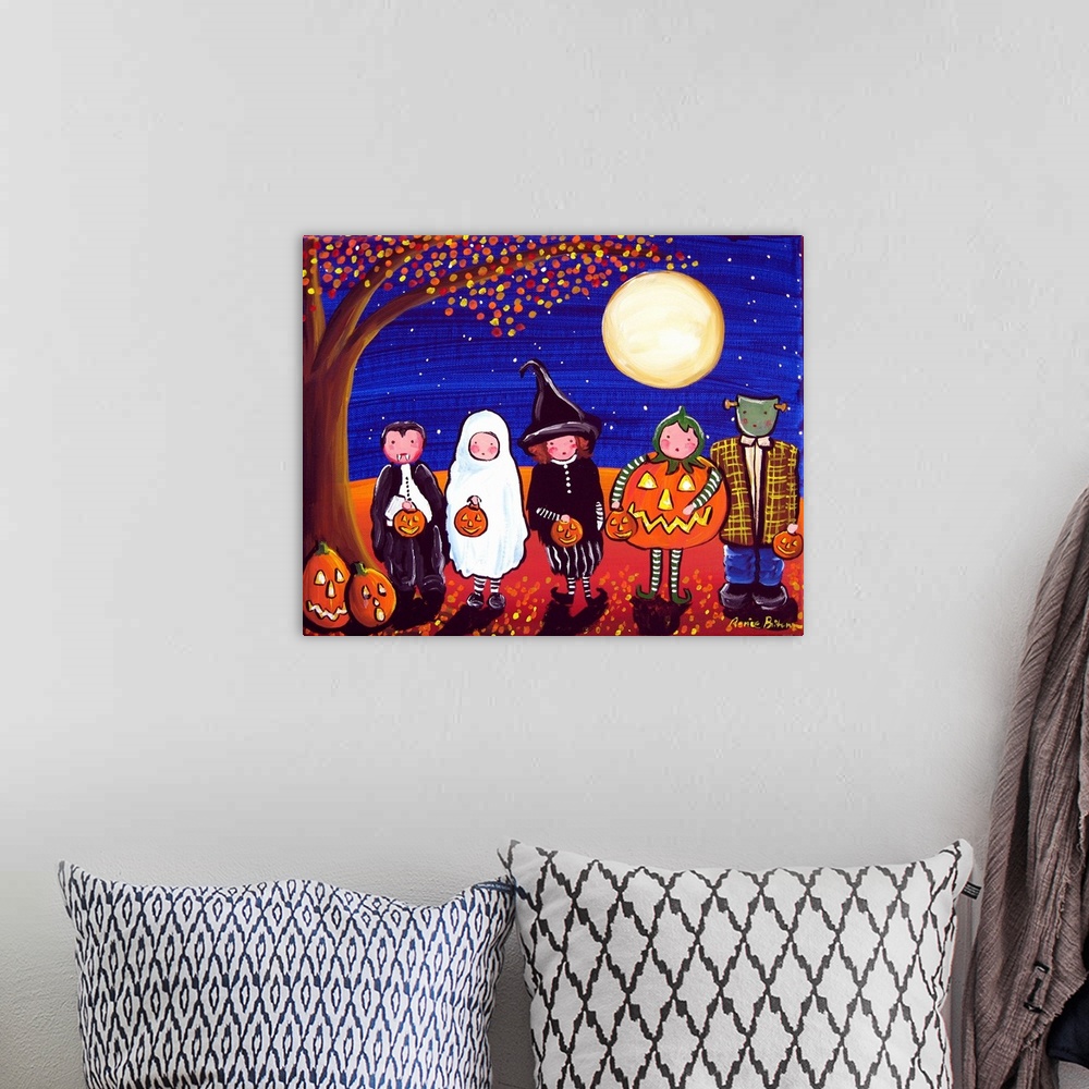 A bohemian room featuring A row of children dressed up for Halloween under a large full moon.