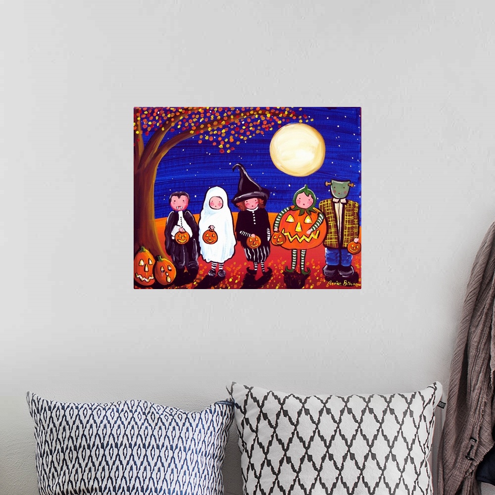 A bohemian room featuring A row of children dressed up for Halloween under a large full moon.