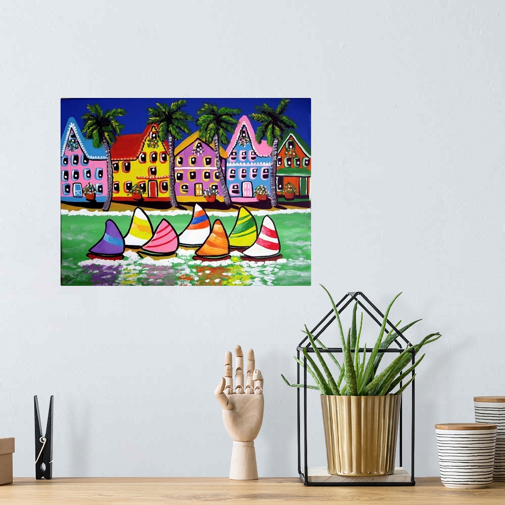 A bohemian room featuring Colorful, tropical beach scene with sailboats.