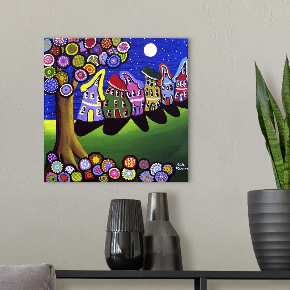 A modern room featuring Fun, slanting houses lean to and fro underneath a colorful tree and full moon.