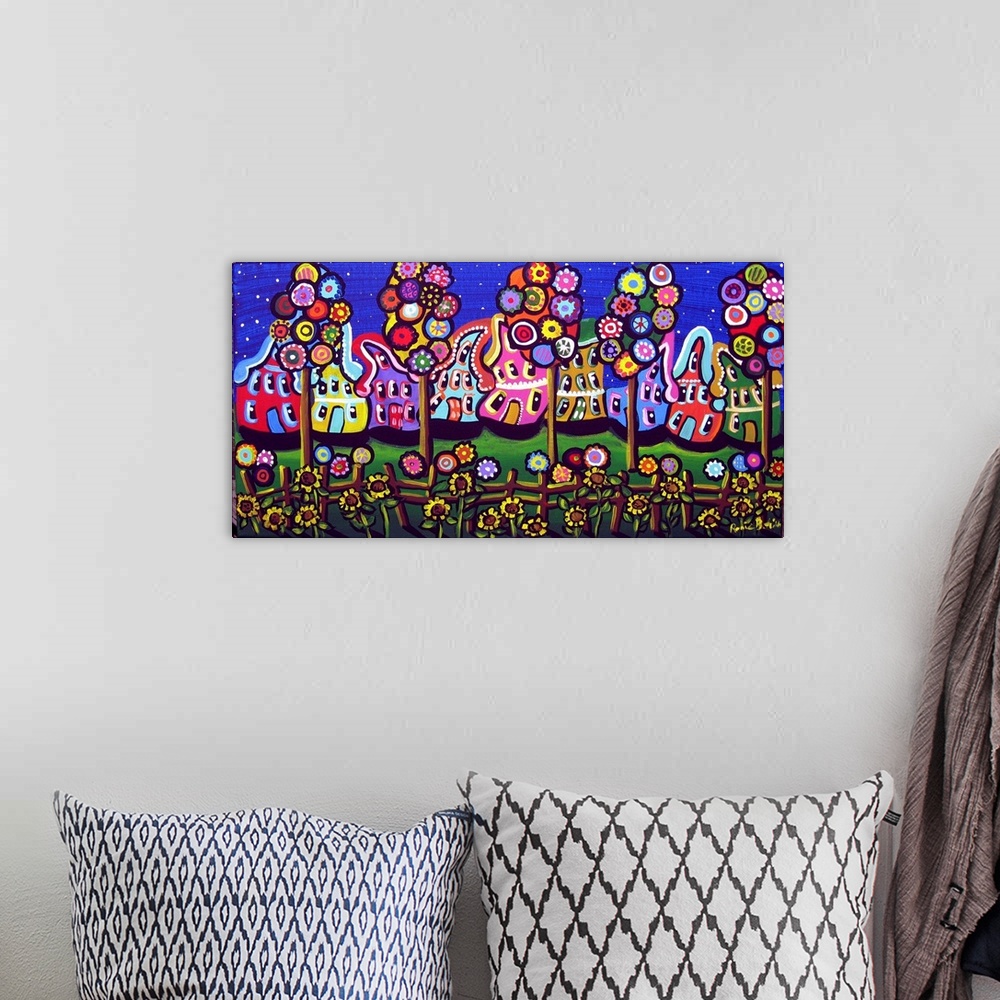 A bohemian room featuring Colorful, whimsical houses, trees and blossoms under a starry sky.