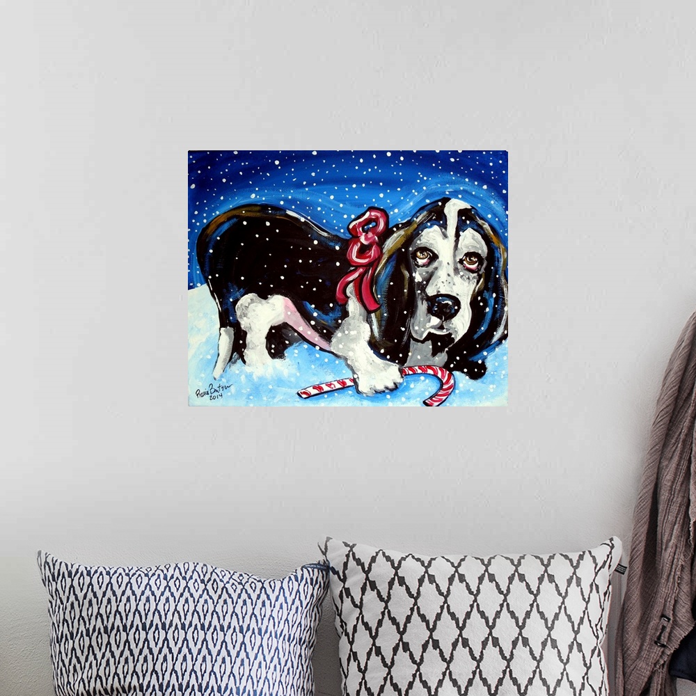 A bohemian room featuring A Basset Hound in the snow with a candy cane.