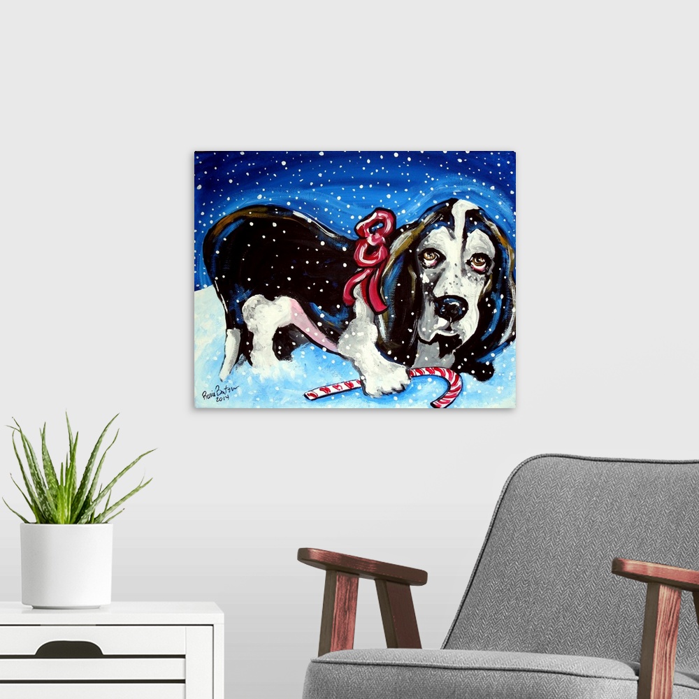 A modern room featuring A Basset Hound in the snow with a candy cane.