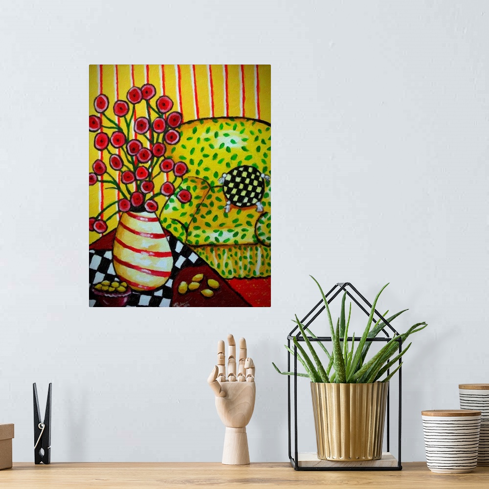 A bohemian room featuring Whimsical folk art still life with a striped vase of red poppies and a big, yellow easy chair.