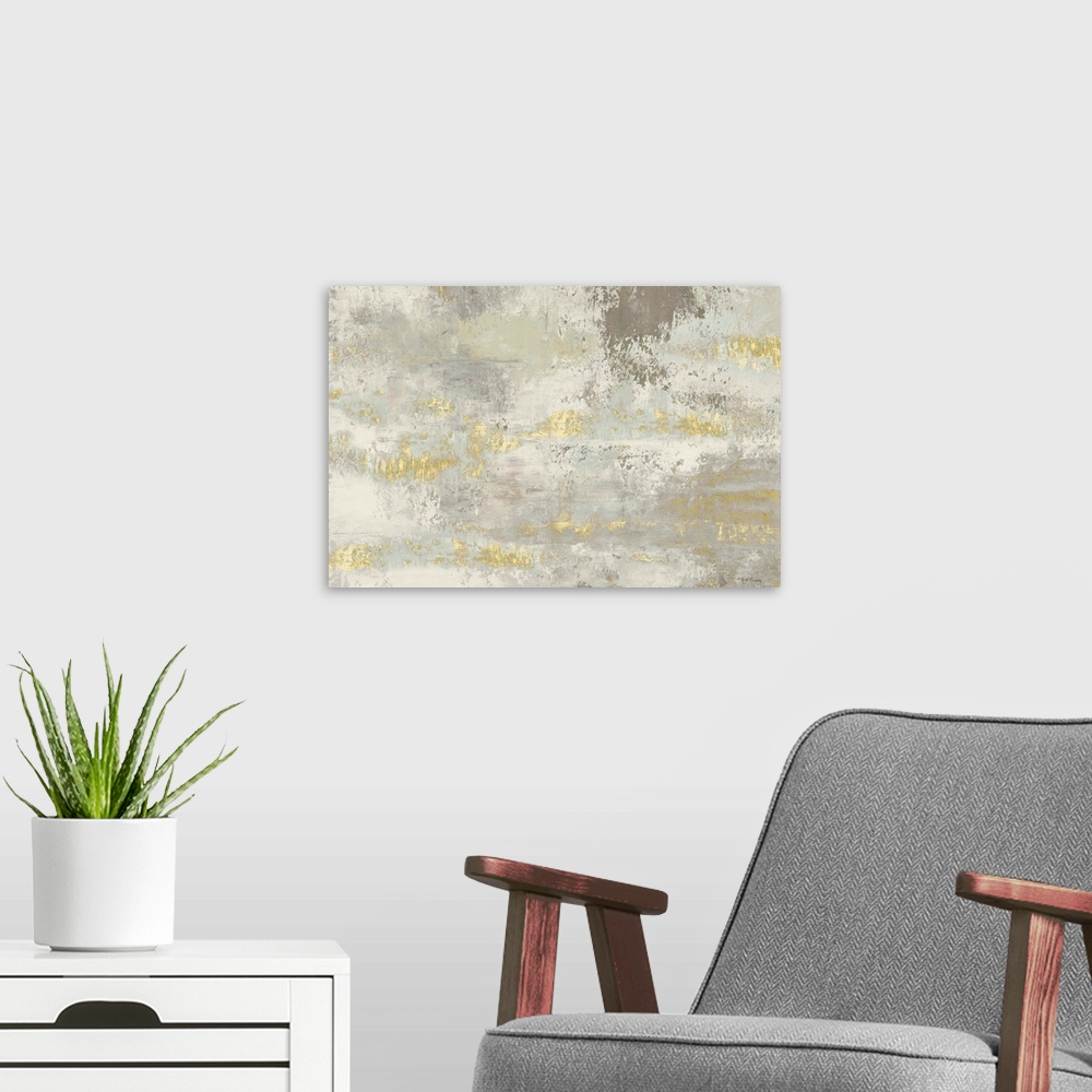 A modern room featuring A large abstract painting in textured tones of gray with gold accents.