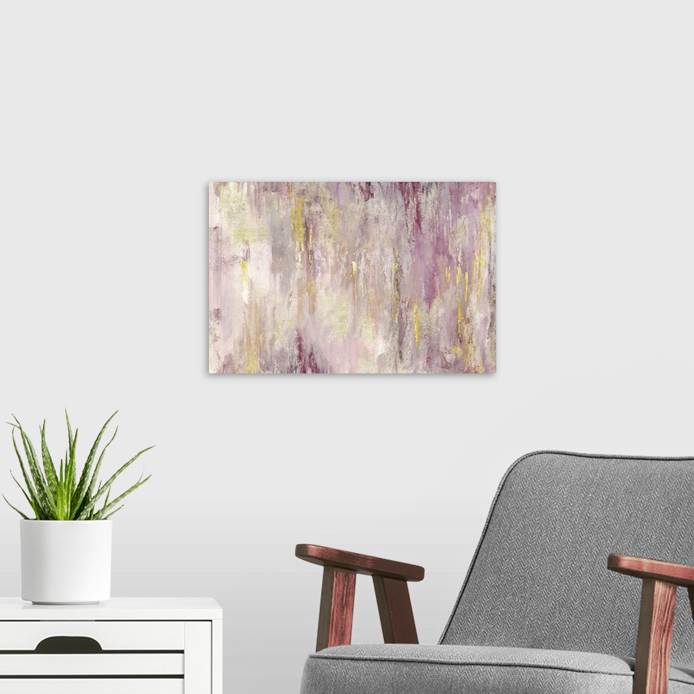 A modern room featuring Horizontal abstract painting with shades of pink and yellow.
