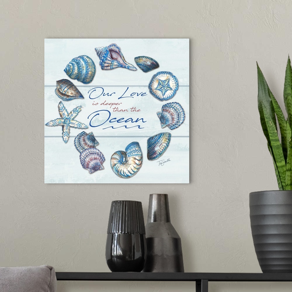 A modern room featuring "Our Love is deeper than the Ocean" surrounds by a wreath of shells on a gray wood panel background.