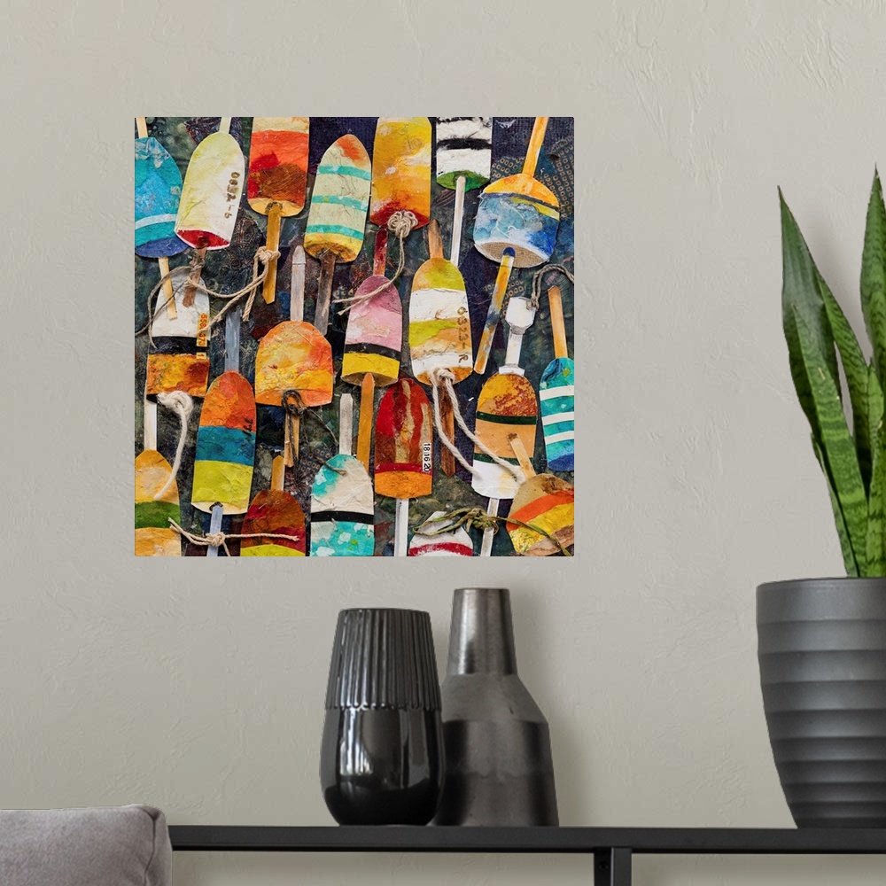 A modern room featuring A mixed media painting of water buoys in bright, multiple colors with rope on a dark backdrop.