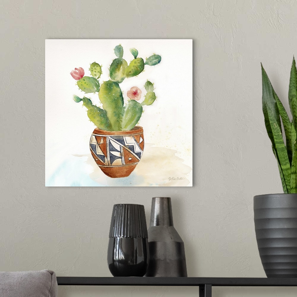 A modern room featuring A square decorative watercolor painting of succulents in colorful clay pots.