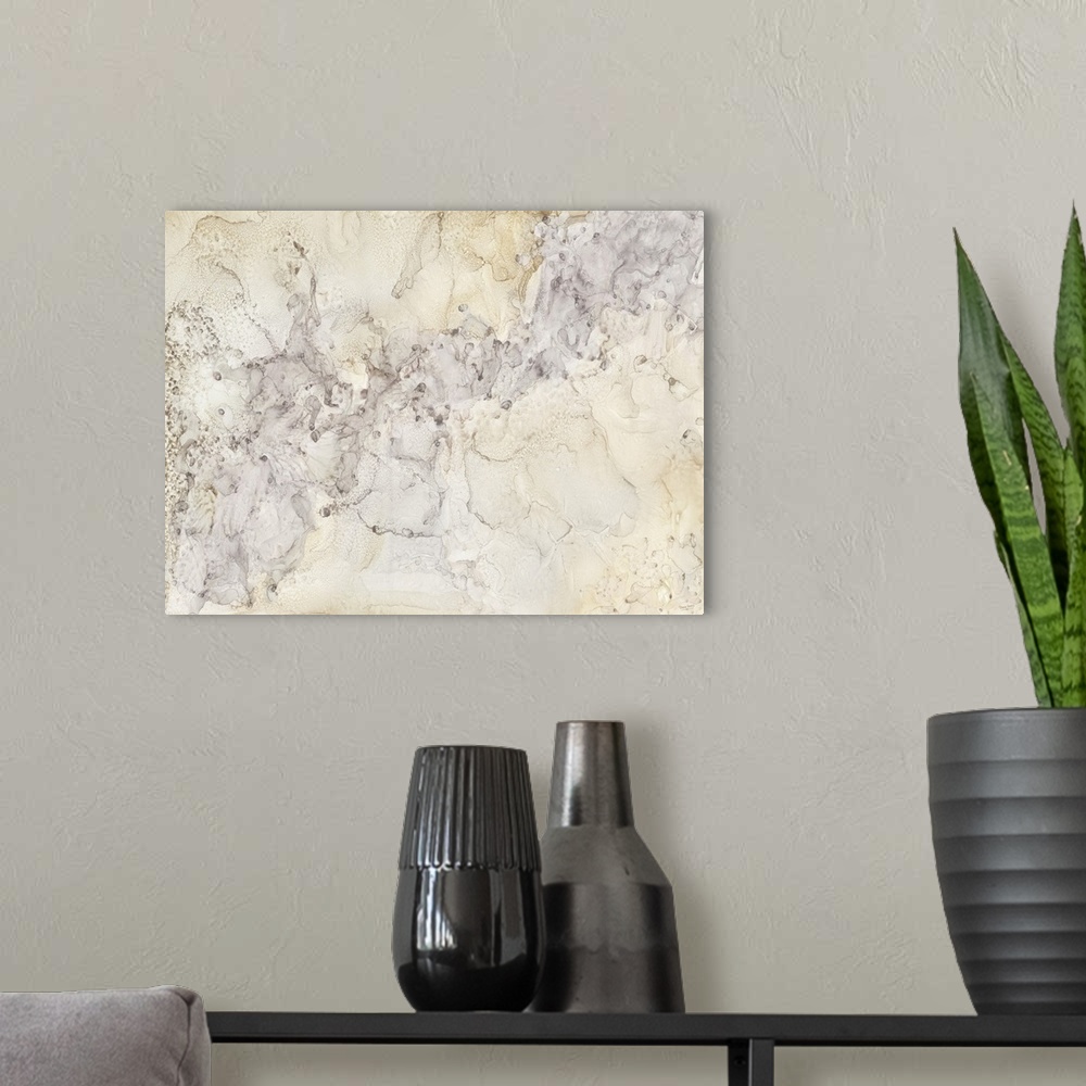 A modern room featuring Horizontal abstract painting in shades of silver and gold in the style of marble.